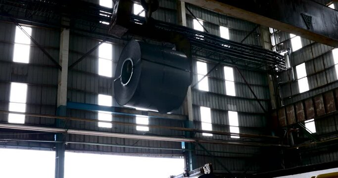 Loading Metal Sheet In A Warehouse Using A Crane And An Electromagnet, Rolled Metal Products.