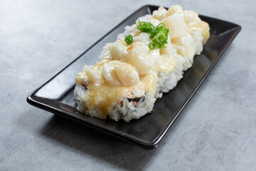 A view of a plate of baked scallops. © DAVID