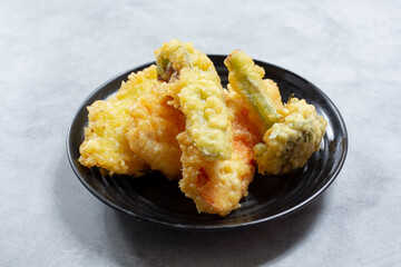 A view of a plate of tempura vegetables.