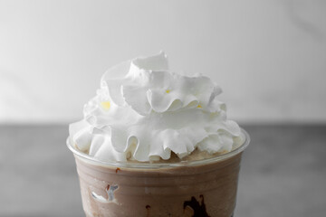 A closeup view of a frozen cappuccino beverage.
