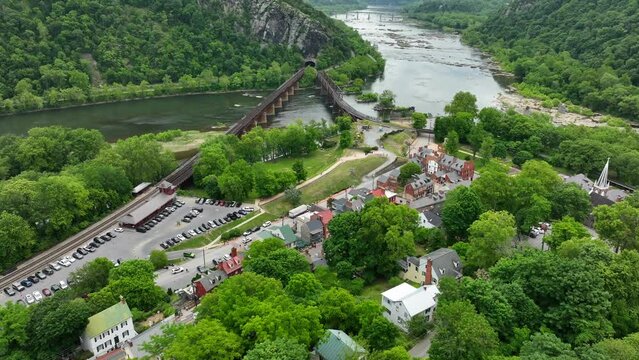 Small town in West Virginia USA mountains. Shenandoah and Potomac Rivers meet with railroad bridge.