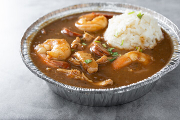 A view of a container of gumbo.