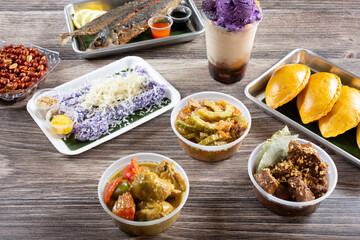 A view of several Filipino appetizers, entrees and desserts.