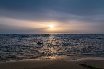 Fototapeta premium Sunset before a dust storm on the Mediterranean Sea. Abnormal heat. Summer. Israel. Bat Yam.