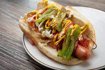 A view of a bacon wrapped hot dog.