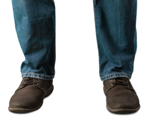 Human legs with jeans and sneaker shoes