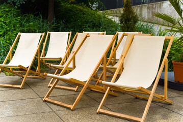 many sun loungers in the open air is available