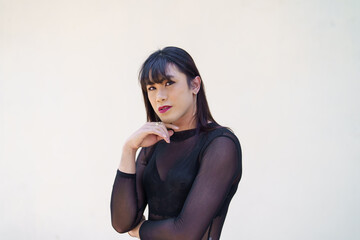 Naklejka premium Portrait of Happy Asian transgender. LGBTQIA wearing make up woman clothes.