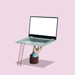 The hand holds a laptop with a white screen. Art collage. Mockup. - 610221222