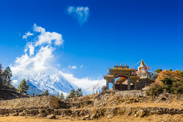 Naklejka premium Himalaya scenic mountain landscape against the blue sky. Manaslu mountain