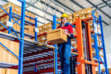 Portrait engineer woman shipping order detail check goods and supplies on shelves with goods background inventory in factory warehouse.logistic industry and business export - obrazy, fototapety, plakaty