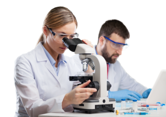 Young woman medical researcher looking through a modern microscope in a laboratory
