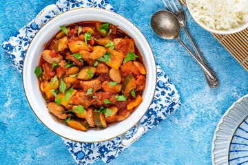 Spanish chicken stew with red wine, chorizo and vegetables