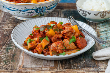 Spanish chicken stew with red wine, chorizo and vegetables