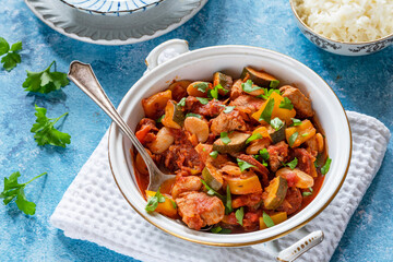 Spanish chicken stew with red wine, chorizo and vegetables