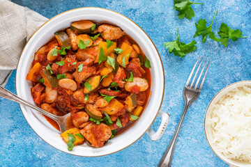 Spanish chicken stew with red wine, chorizo and vegetables