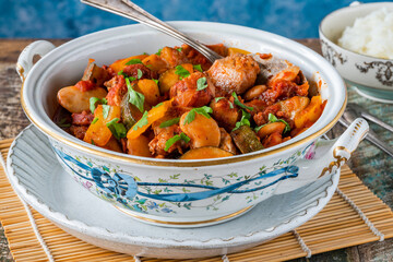 Spanish chicken stew with red wine, chorizo and vegetables