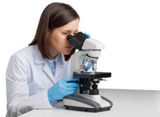 Young woman medical researcher looking through a modern microscope in a laboratory