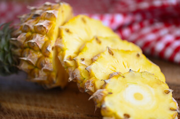 pineapple slice on plate for food fruit ripe pineapple on wooden background, fresh pineapple tropical fruits summer