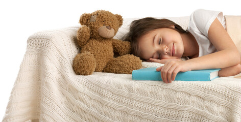 Cute child little girl sleeps in the bed with a toy teddy bear