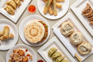 Hero shot composition of traditional Chinese street food photographed from above. 