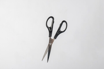 Office stationery scissors cutting on white background