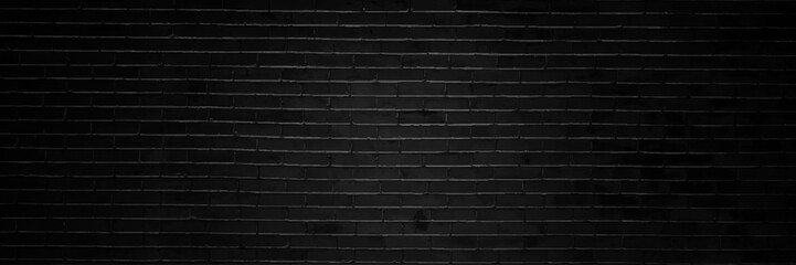 Abstract black brick wall texture for pattern background. wide panorama picture.