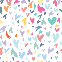 Seamless colorful pattern with hearts on white background. Vector.