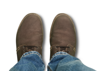 Human legs with jeans and sneaker shoes