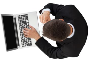 Business man working on laptop view top