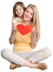 Fototapeta na wymiar Happy mother with little girl and red heart