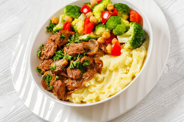 beef mushrooms stew with mashed potato and salad