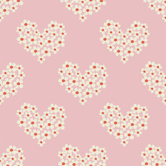 Seamless pattern with heart shape with flowers of daisy flowers in Groovy style on a pink background
