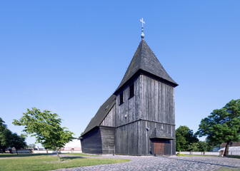 Fototapeta na wymiar Kosieczyn, Poland - medieval, wooden church built circa 1400.