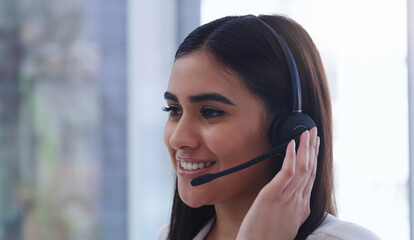 Call center, smile and microphone with business woman in office for customer service, technical support or consulting. Agent, contact us and help desk with employee for advisory, solution or sales