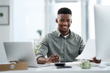 Fototapeta na wymiar Black man, portrait and laptop with documents for finance, audit or accounting at the office desk. Happy African male accountant or businessman with smile for financial planning, budget or paperwork