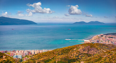 Fototapeta premium Astonishing spring cityscape of Vlore city from Kanines fortress. Beautiful morning sescape of Adriatic sea. Aerial outdoor scene of Albania, Europe. Traveling concept background.