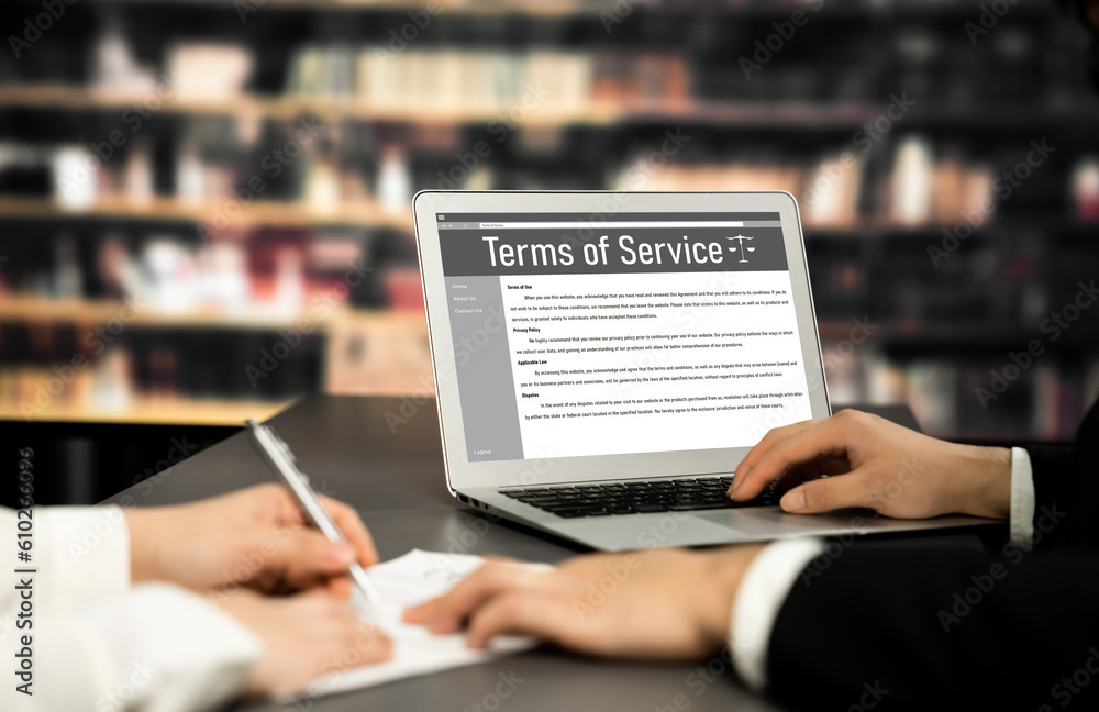 Poster online term of service conditions showing astute rules and regulations in using the website on a lap