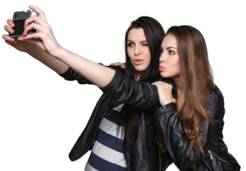 Two young naughty girls friends having fun.