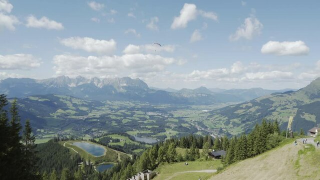 Parasailer flying high above Austrian Alps