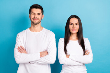 Photo portrait of nice young guy girl folded arms confident businesspeople dressed stylish white outfit isolated on blue color background