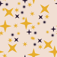 Seamless pattern with yellow and blue stars on light pink background