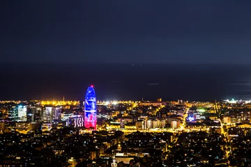 Fototapeten Night view of the city of Barcelona from a hill. © AlvaroRT