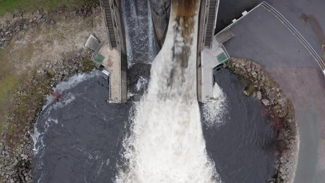 Looking from above as the big verticle lift gates release water from theFinistere dam 