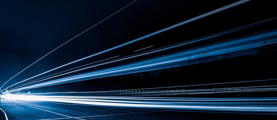 Fototapeta na wymiar blue car lights at night. long exposure