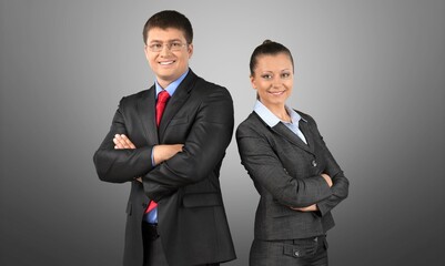 Young business couple man and woman with crossed hands