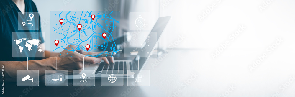 Poster man using a laptop with virtual world and model map with location point , gps app, icon travel maps 