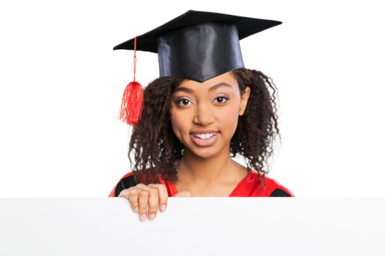 Smiling female graduate holding a sign