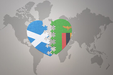 puzzle heart with the national flag of zambia and scotland on a world map background.Concept.