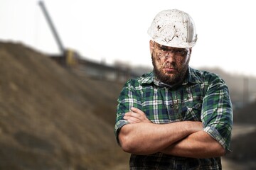 Fototapeta premium A young mine worker in protective wear